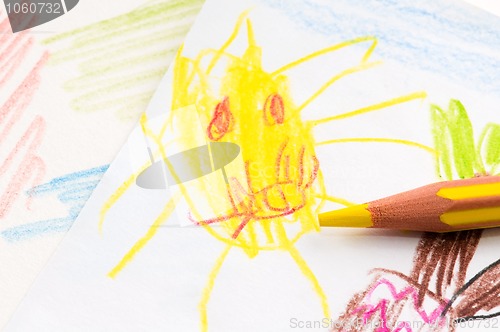 Image of pencil and child drawing