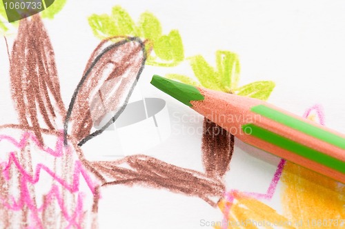 Image of pencil and child drawing