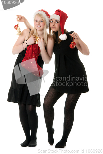 Image of Two girls in the Santa hat