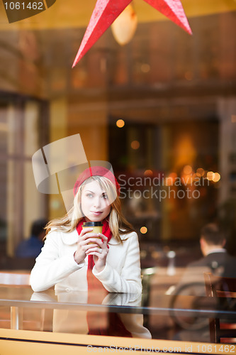 Image of Woman drinking coffee