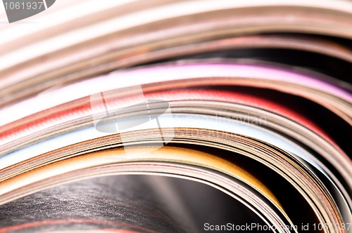 Image of Stack of open magazines