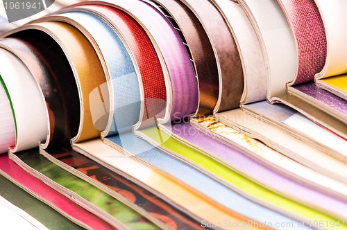 Image of Stack of open magazines