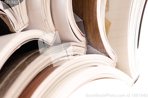 Image of Stack of open magazines