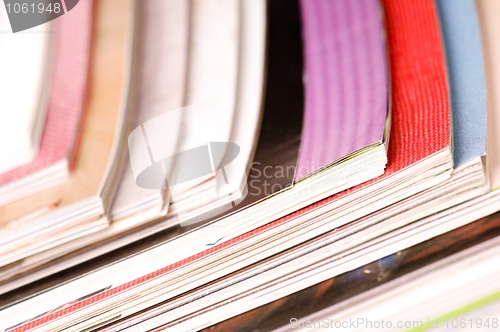 Image of Stack of open magazines