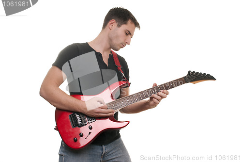 Image of Man plays the guitar