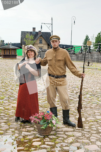 Image of Couple of lady and soldier in retro style picture