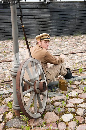 Image of Retro style picture with resting soldier.