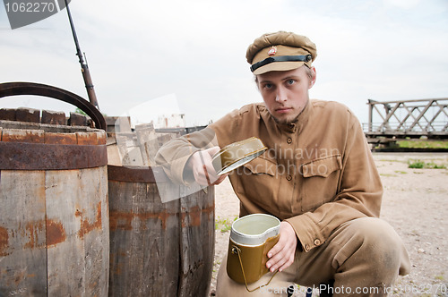 Image of Soldier with boiler in retro style picture