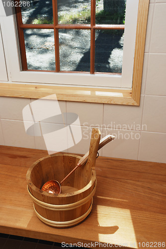 Image of bathing wash-tub and a scoop