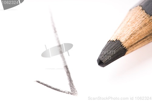 Image of pencil writing on white paper 