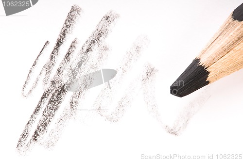 Image of pencil writing on white paper 