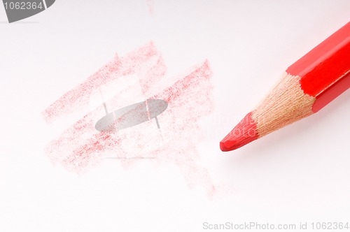 Image of pencil writing on white paper