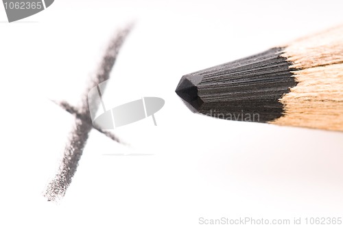 Image of pencil writing on white paper