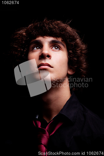 Image of young man looking up