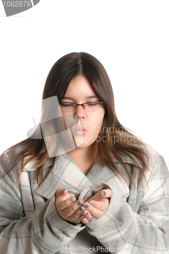 Image of Teenager Blowing