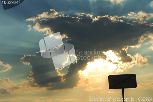 Image of sunset and small black table