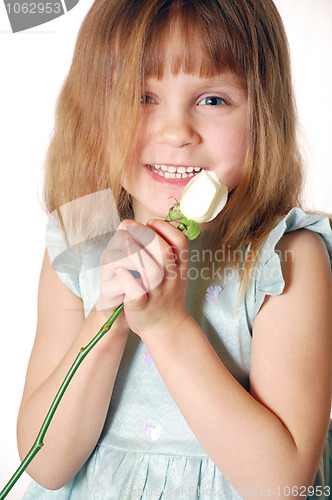 Image of child with a rose