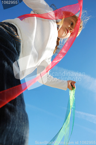 Image of child ribbons and sky