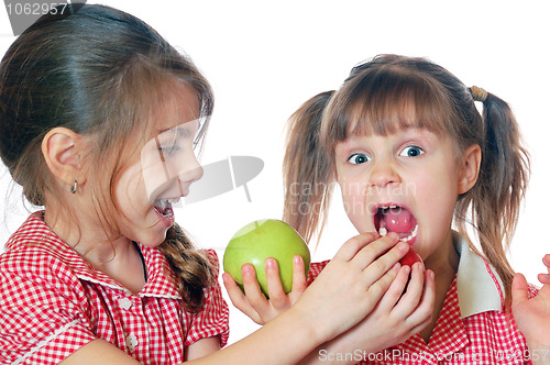 Image of kids playing with apples