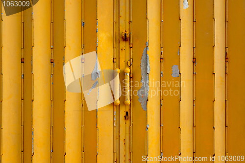 Image of yellow metal gate