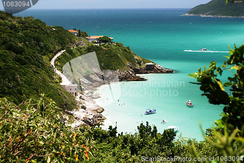 Image of Boats over a crystalline turquoise sea in Arraial do Cabo, Rio de janeiro, Brazil