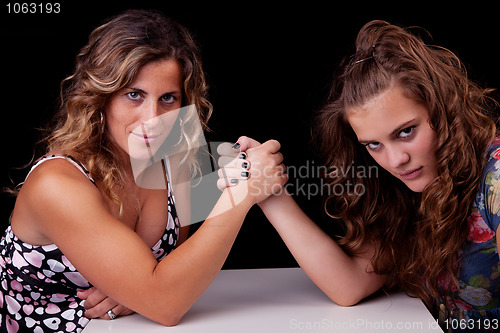 Image of mother and daughter wrestling