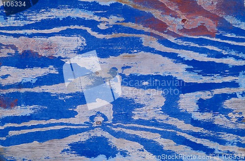 Image of Faded wood with blue stain patterns