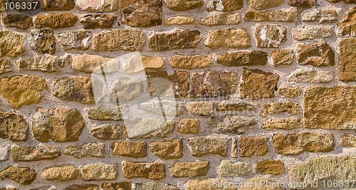 Image of Honey-coloured stone wall background