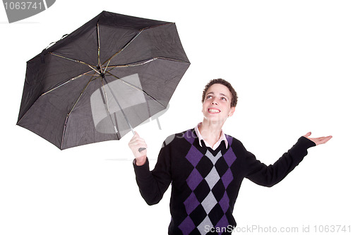 Image of Young boy bypassing the umbrella