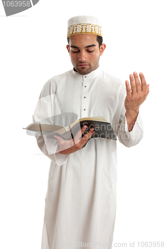 Image of Teacher or Preacher reading from a book