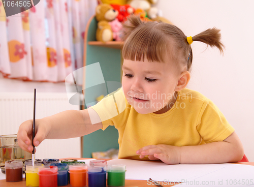 Image of Child play with paints in preschool