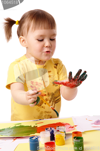 Image of Cute child paint her fingers