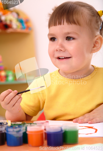 Image of Child play with paints in preschool