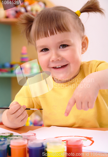 Image of Child play with paints in preschool