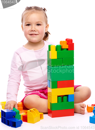 Image of Little girl with building bricks