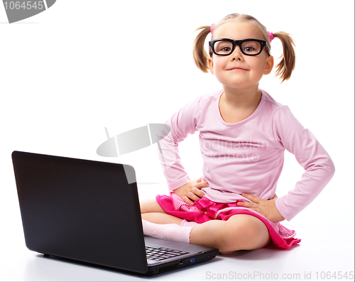 Image of Little girl with laptop