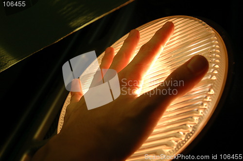 Image of hand on fog light