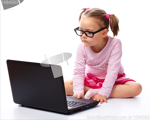 Image of Little girl with laptop
