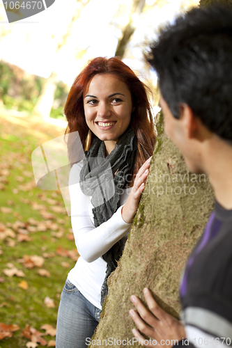 Image of Young couple having fun at the park