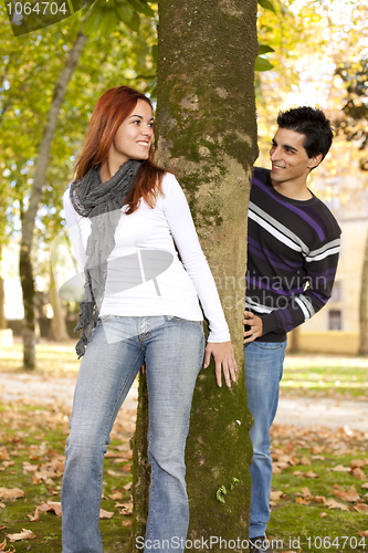 Image of Young couple having fun at the park