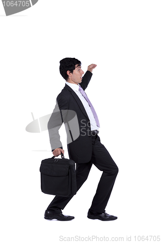 Image of Businessman walking step by step