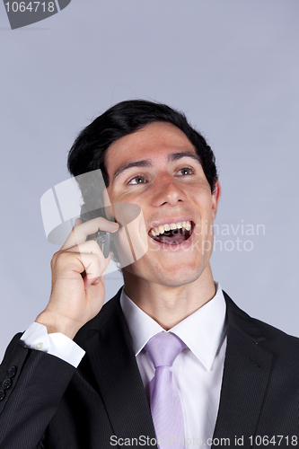 Image of businessman talking on the cellular