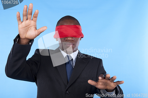 Image of blindfold african businessman