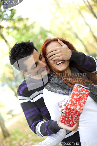 Image of young couple surprise