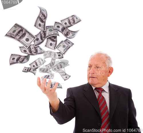 Image of Businessman holding money