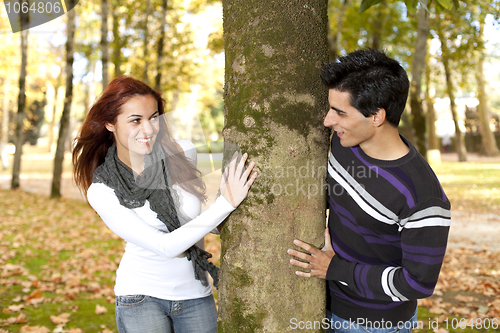 Image of Young couple having fun at the park