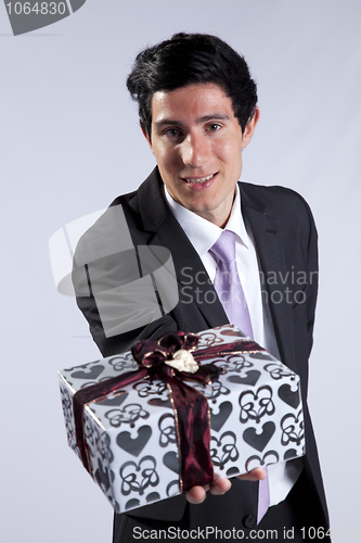 Image of Businessman with a gift package