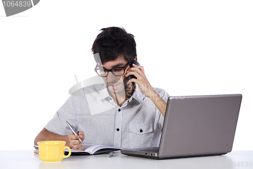 Image of Young modern busy businessman