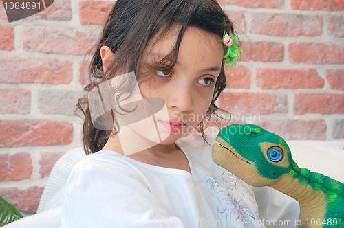 Image of girl with a dino