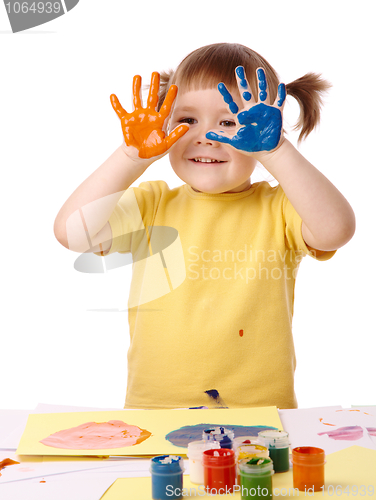 Image of Cute child with painted hands
